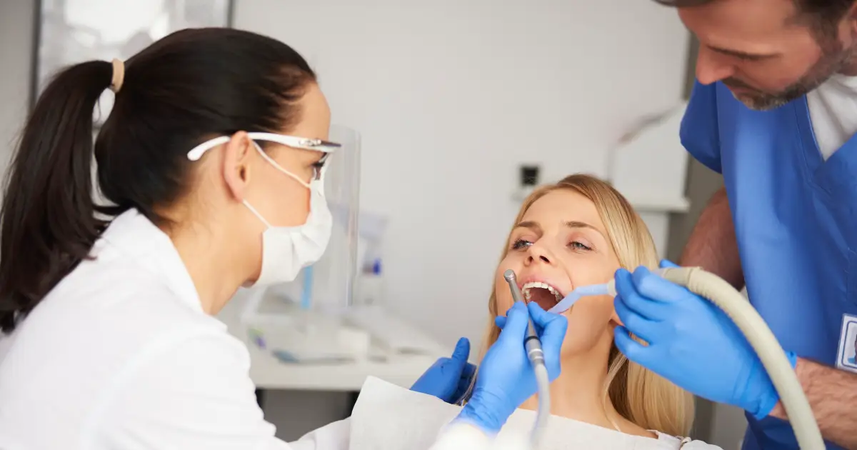 Dentist performing root canal therapy in Carmichael CA 95608 at Mission Dental